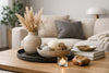 Accessoires combineren op een salontafel
