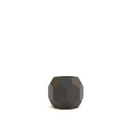 Black geometric vase on a white background