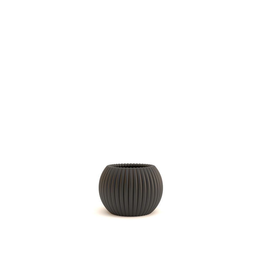 Black ribbed pot on a white background