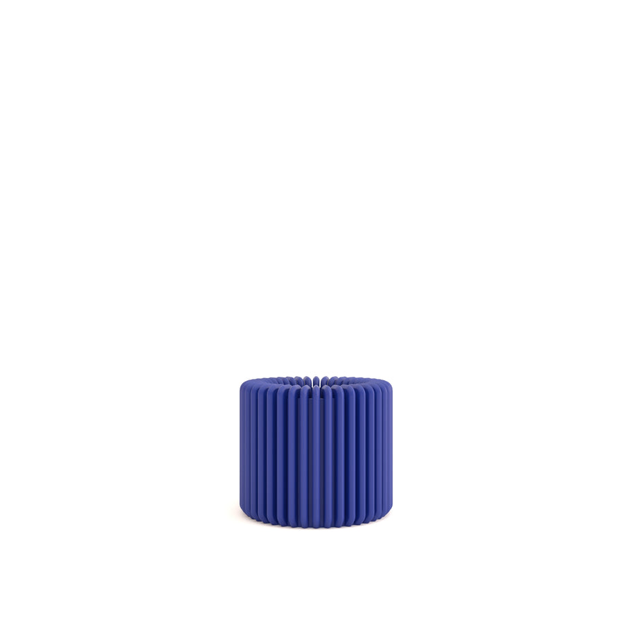 Blue and white patterned mug on a light gray background