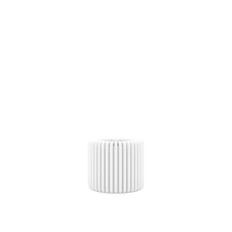 White ribbed container on a white background