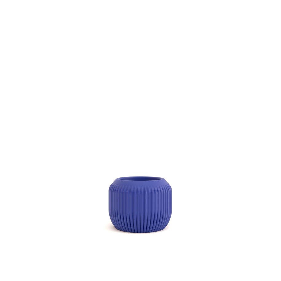 Blue textured vase on a white background