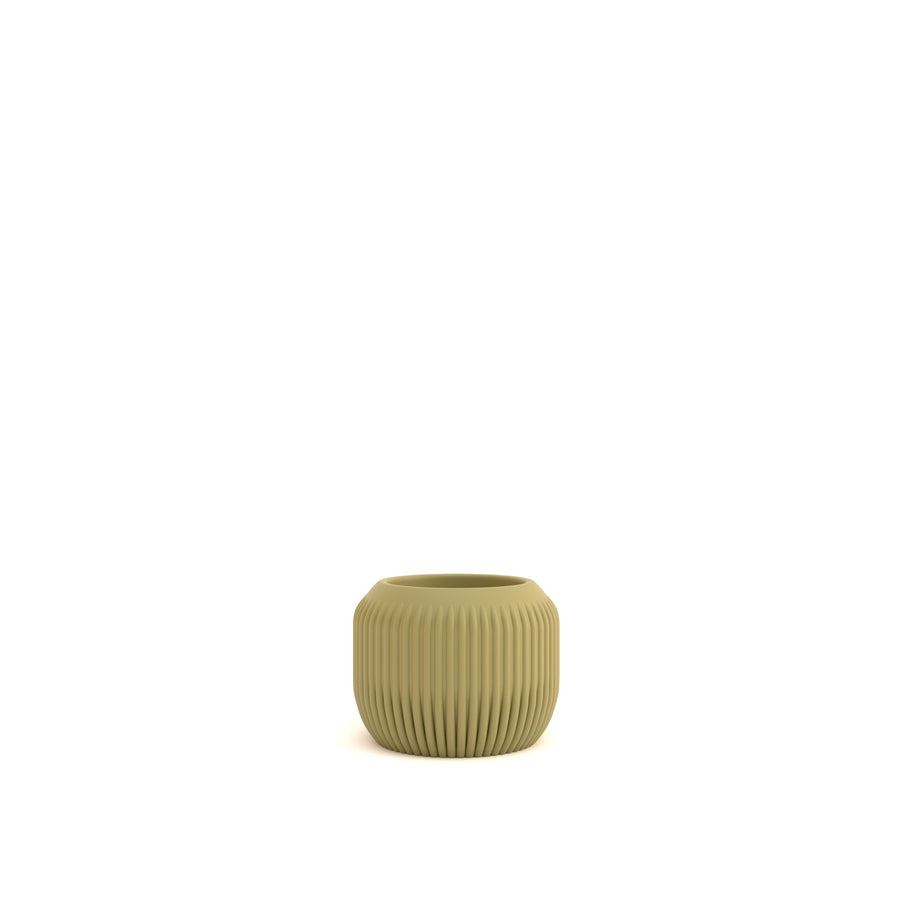 Green ceramic pot on a white background