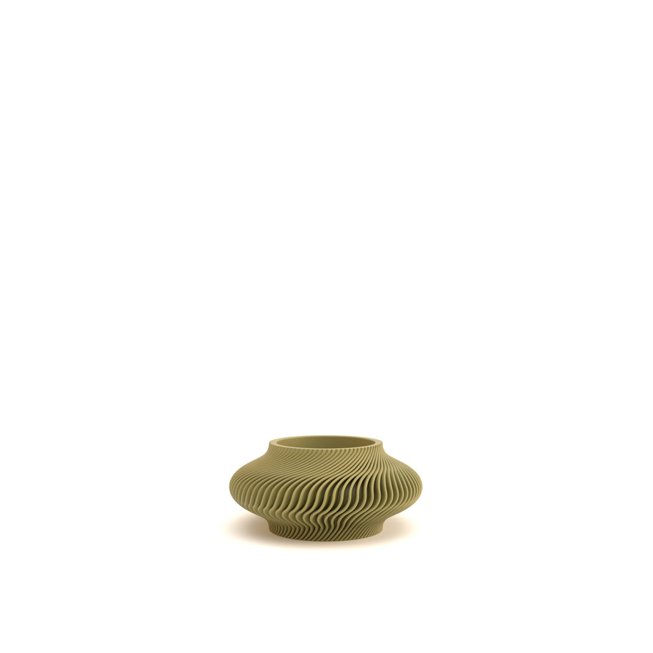 Green textured vase on a white background