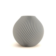 Gray textured vase on a white background