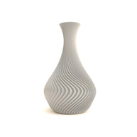 Silver textured vase on a white background